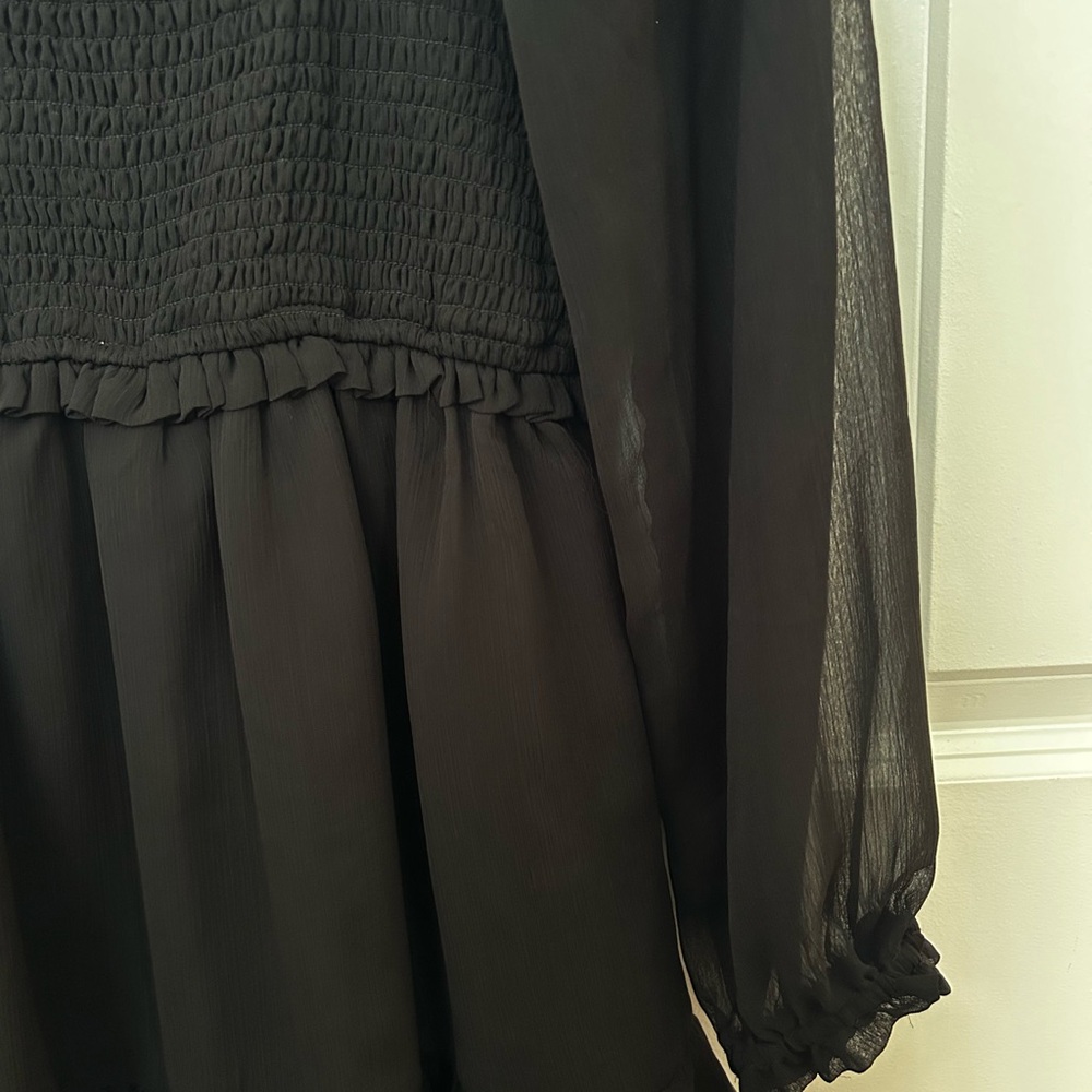 Black long sleeve dress, sheer sleeve, worn three times. Brand is 1. STATE.